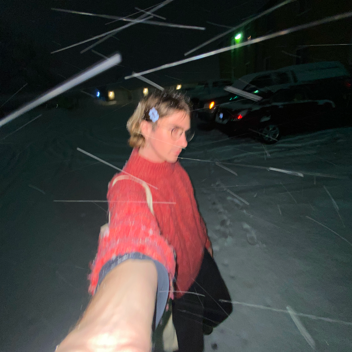 A photo of and in the snow wearing a cute sweater and taking a selfie :3